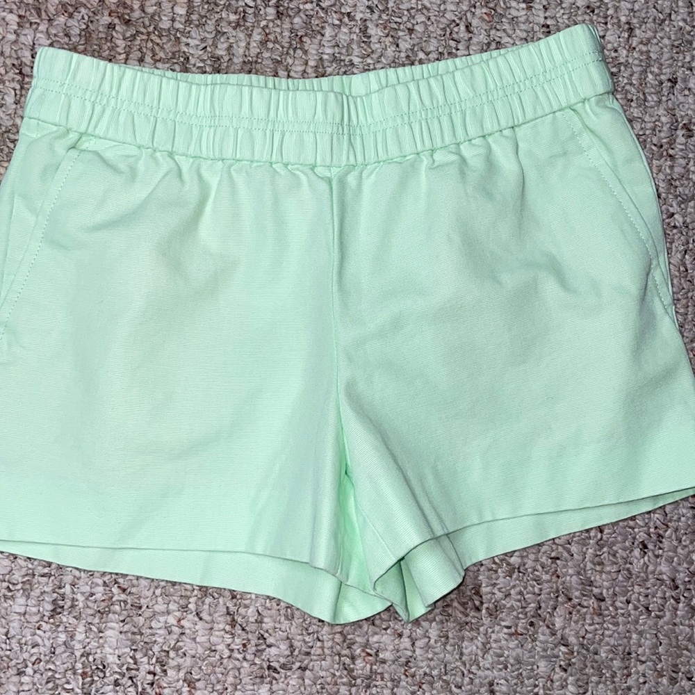 J. Crew size 4 Pull on, elastic waist band shorts, lime green color.